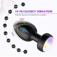 Анальна пробка Light Anal Plug що світиться, з вібрацією та Д/К, 3.5*9 см, чорна