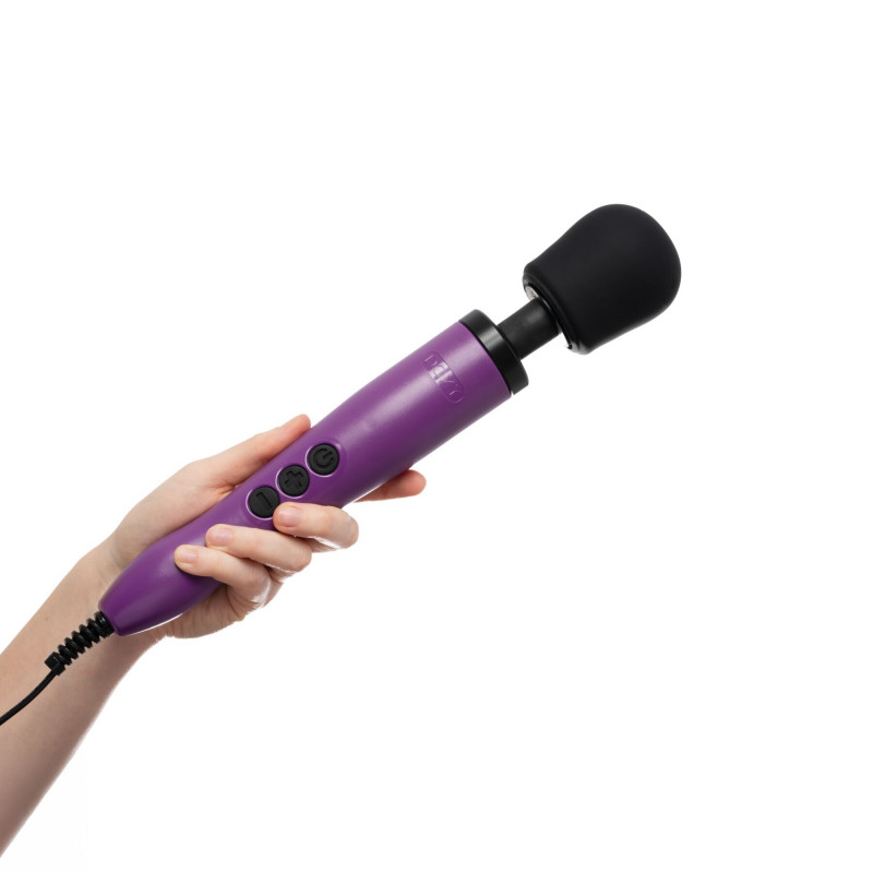 Крупний план поверхні вібромасажера Doxy Original Purple, текстура матеріалу, приємний на дотик