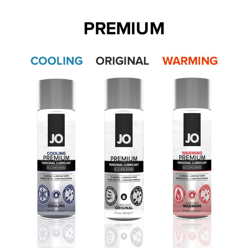 Лубрикант JO PREMIUM WARMING, флакон в руці, демонстрація об'єму 30 мл