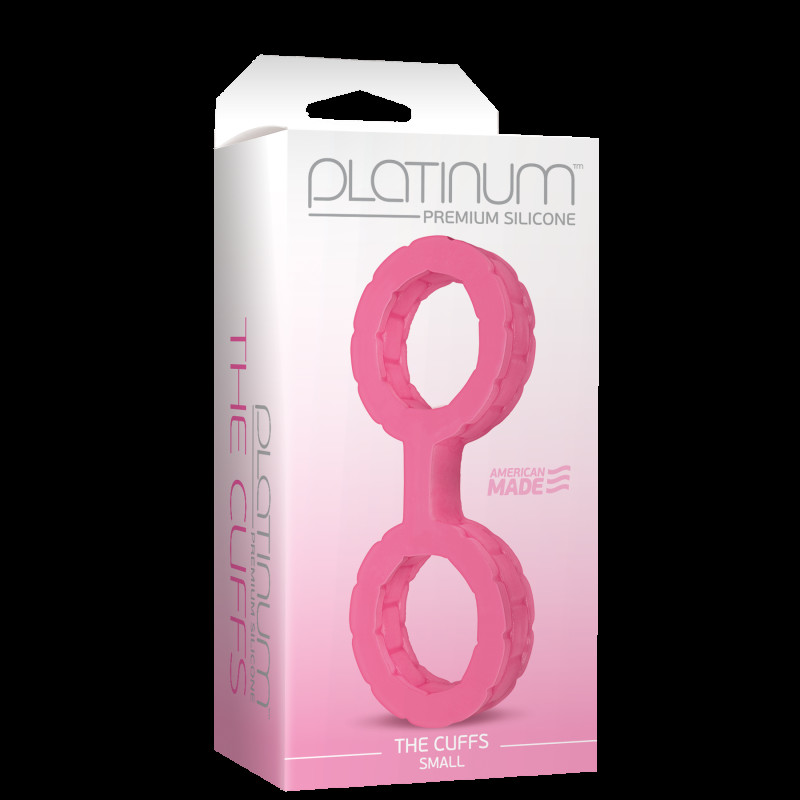 Близький вид силіконових наручників Doc Johnson The Cuffs Small Pink, що показує їхню гнучкість та текстуру, рожевий колір