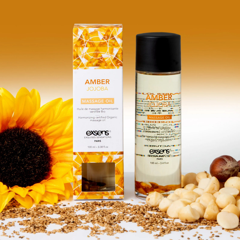 Текстура масажної олії Exsens Amber Jojoba (гармонізуюча) 100мл, натуральна, крапля олії на поверхні