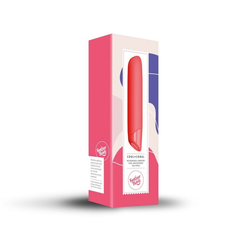 Вібратор SugarBoo Cool Coral в контексті, оточений м'якими елементами