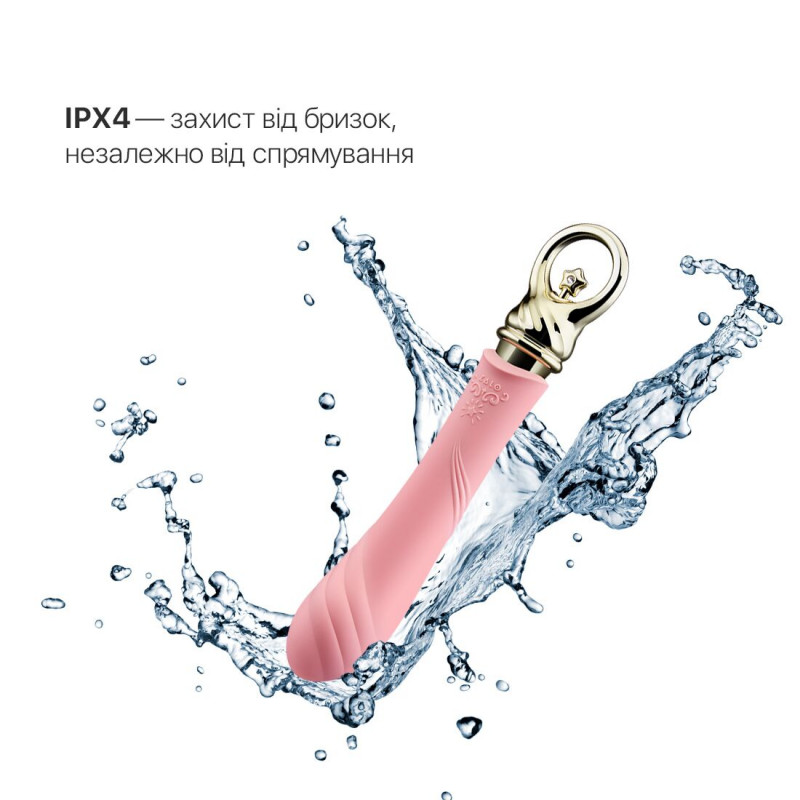 Вібратор Zalo Sweet Magic Courage Fairy Pink з увімкненим підігрівом, видно випромінюване тепло