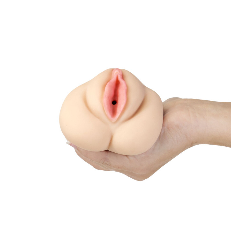 Мастурбатор-вагіна CutiePies Trainer Tamara, детальний вигляд збоку, що демонструє форму.