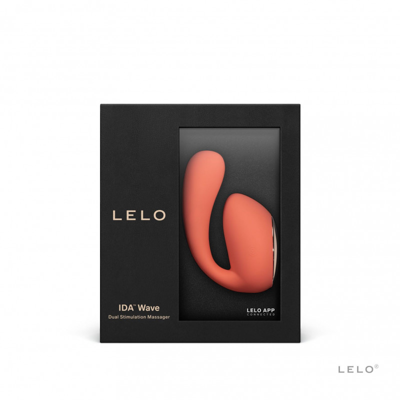 Смарт-вібратор LELO Ida Wave кораловий червоний в оточенні елементів, що підкреслюють його преміальність та технологічність
