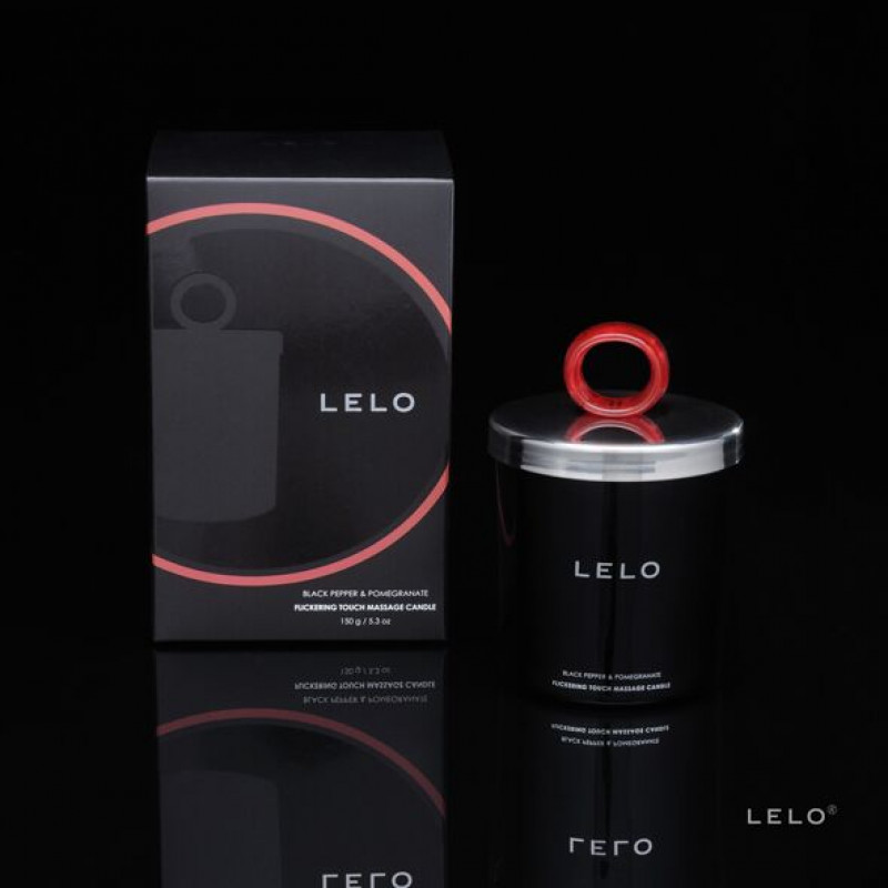 Упаковка масажної свічки LELO Massage Candle Black Pepper & Pomegranate, елегантна чорна коробка з золотим тисненням бренду.