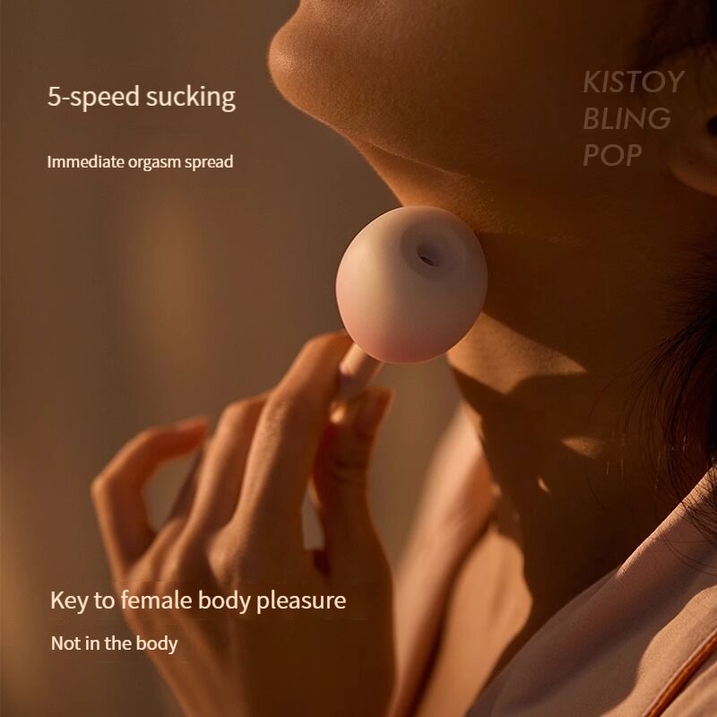 Вакуумний стимулятор-вібратор KISSTOY Bling Pop та його зарядний кейс-нічник разом, готовий до використання