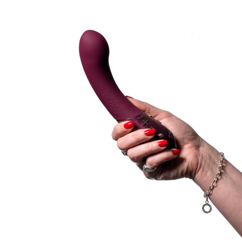 Вібратор Hot Octopuss KURVE в руці, демонструє розмір та зручність використання