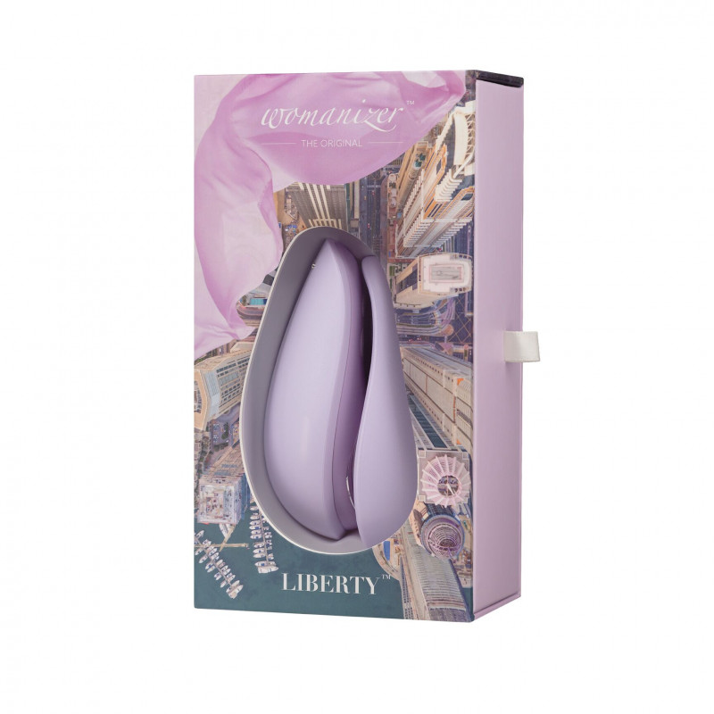 Вакуумний кліторальний стимулятор Womanizer Liberty Lilac з різних ракурсів, що дозволяє оцінити його загальний вигляд та дизайн.