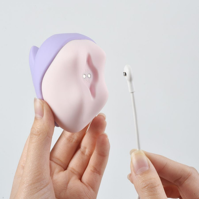 Вакуумний кліторальний стимулятор Magic Motion Unicorn Purple, показано кнопку керування