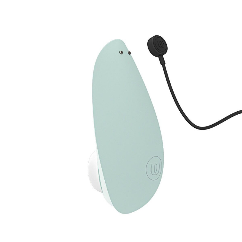 Магнітна кришечка вакуумного стимулятора Womanizer Liberty 2 Sage, що демонструє зручний спосіб зберігання