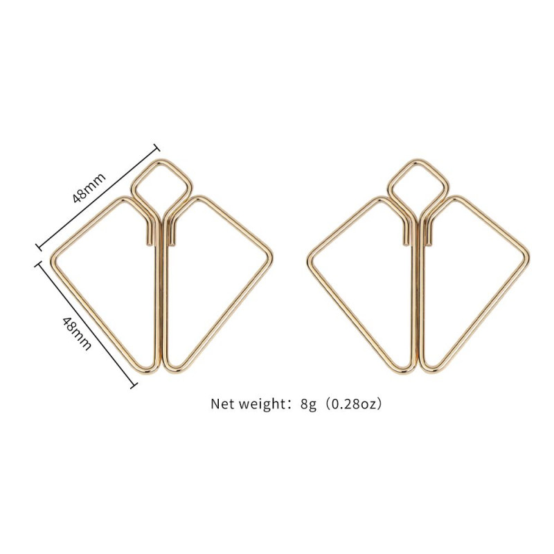 Фото затискачів для сосків LOCKINK Nipple Clamps Golden на нейтральному фоні