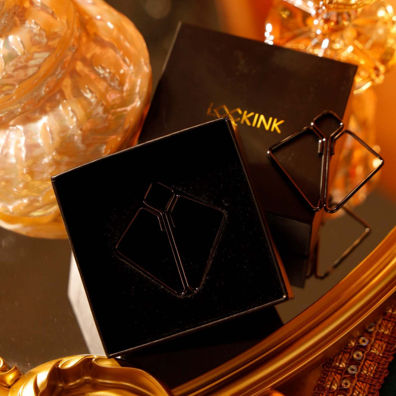 Ширина розкриття сірих затискачів для сосків LOCKINK, що показує їх функціональність