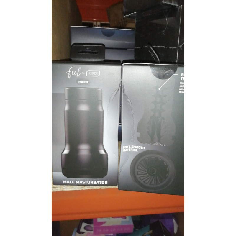 Мастурбатор Kiiroo Feel Pocket м'ятного кольору, вид збоку, демонструє ергономічний дизайн