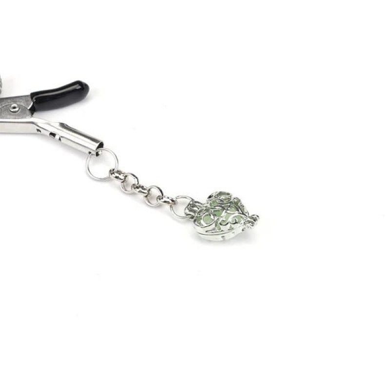 Детальний вигляд затискачів для сосків Liebe Seele Glow-in-dark Green збоку, демонструючи їхню унікальну форму