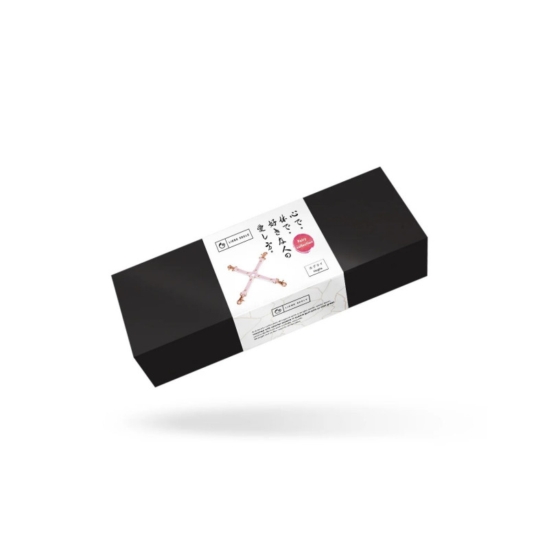 Вигляд збоку на хрестовину для бондажу Hogtie Liebe Seele, біло-рожева шкіра, демонстрація кріплень