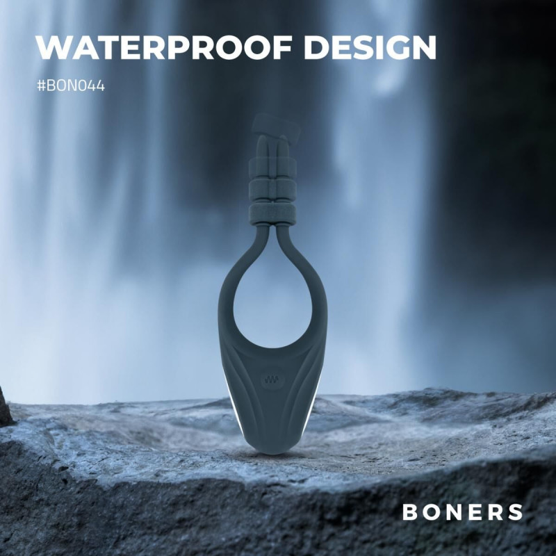 Ерекційне кільце Boners Adjustable - на чоловічій руці для демонстрації розміру