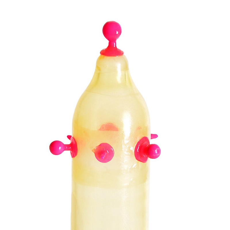 Recare Pink Monster Spike Condom - детальний вигляд рожевої насадки з кульками збоку